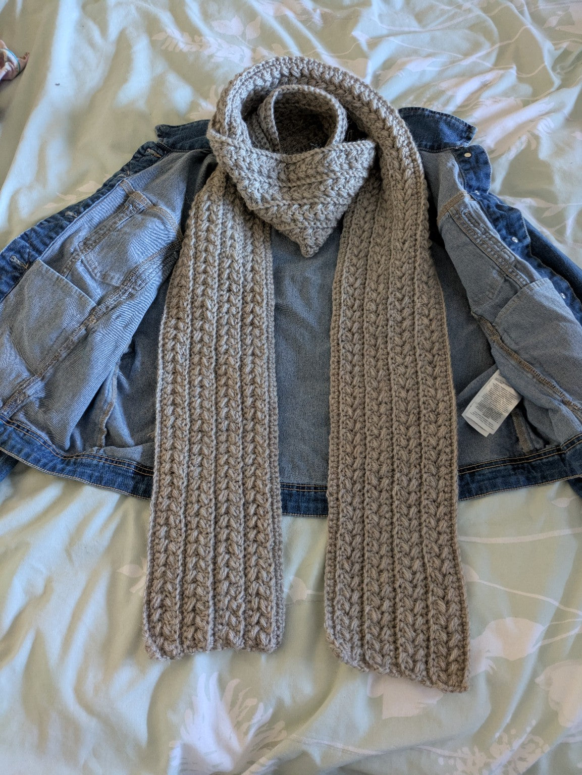Long chunky crochet scarf displayed flat